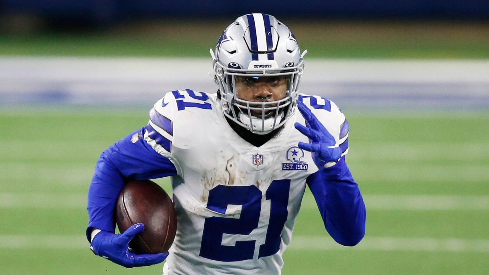 Dallas Cowboys running back Ezekiel Elliott runs with the ball